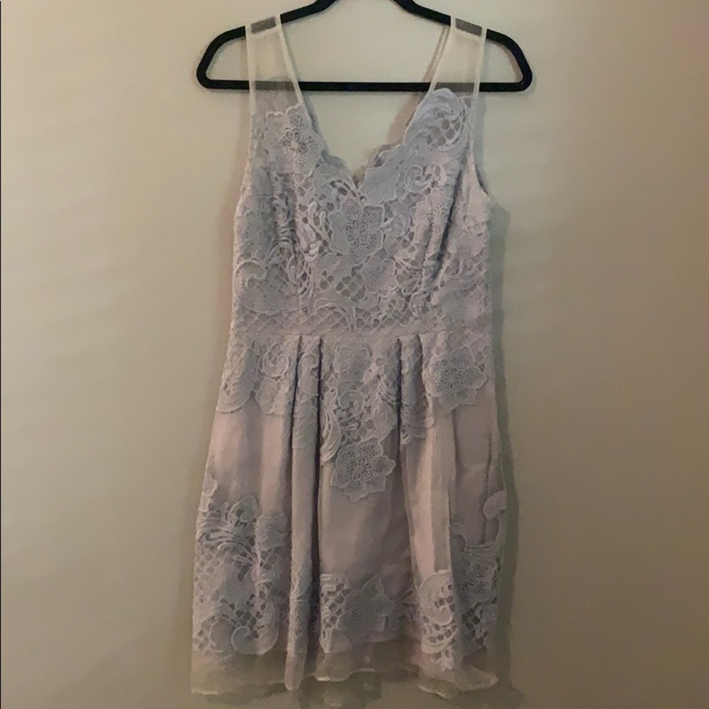 BHLDN dusty blue dress with lace detail.